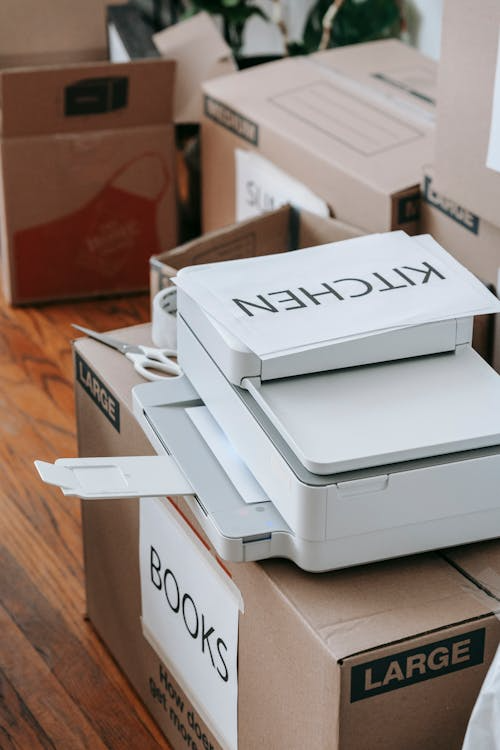 a printer on a top of a box