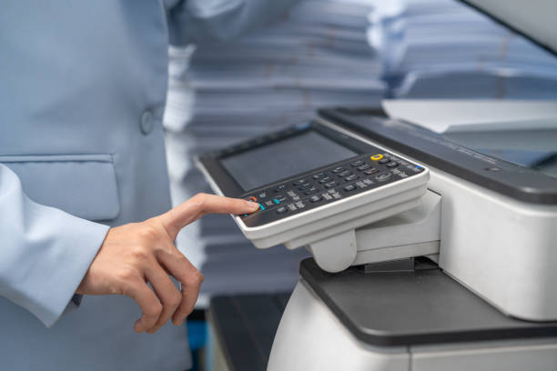 a person using industrial printer