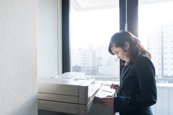 an office worker using a printer