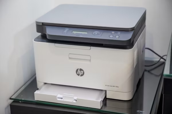 phot of a white HP commercial printer